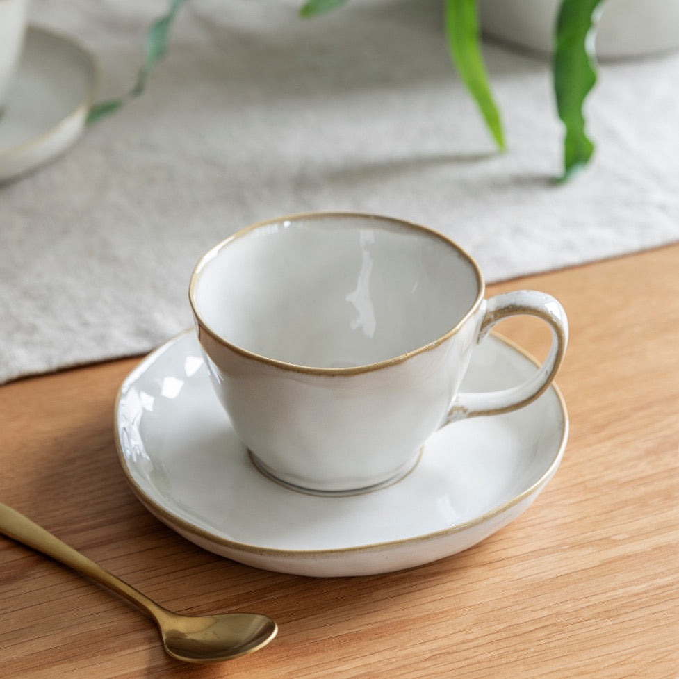 Off-White Ceramic Cup and Saucer
